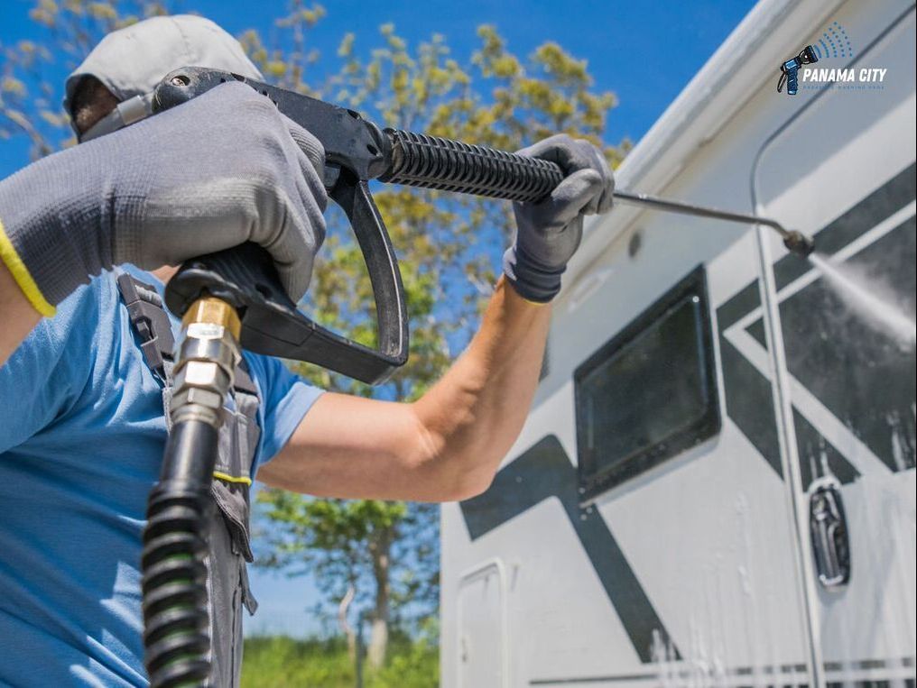 power washing the side of a RV in Panama City